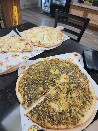 Photo of Mouneh Lebanese Gourmet Food & baking - 2406 King George Blvd, Surrey, BC V4P 1H5